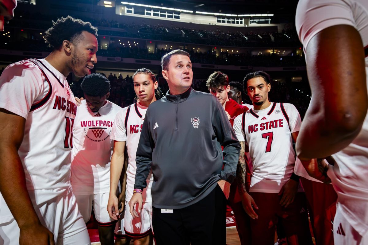 NC State head coach Will Wade speaks to his team before the game against Virginia Tech in the Lenovo Center on Saturday, Feb. 7, 2026. The Wolfpack defeated the Hokies 82-73.