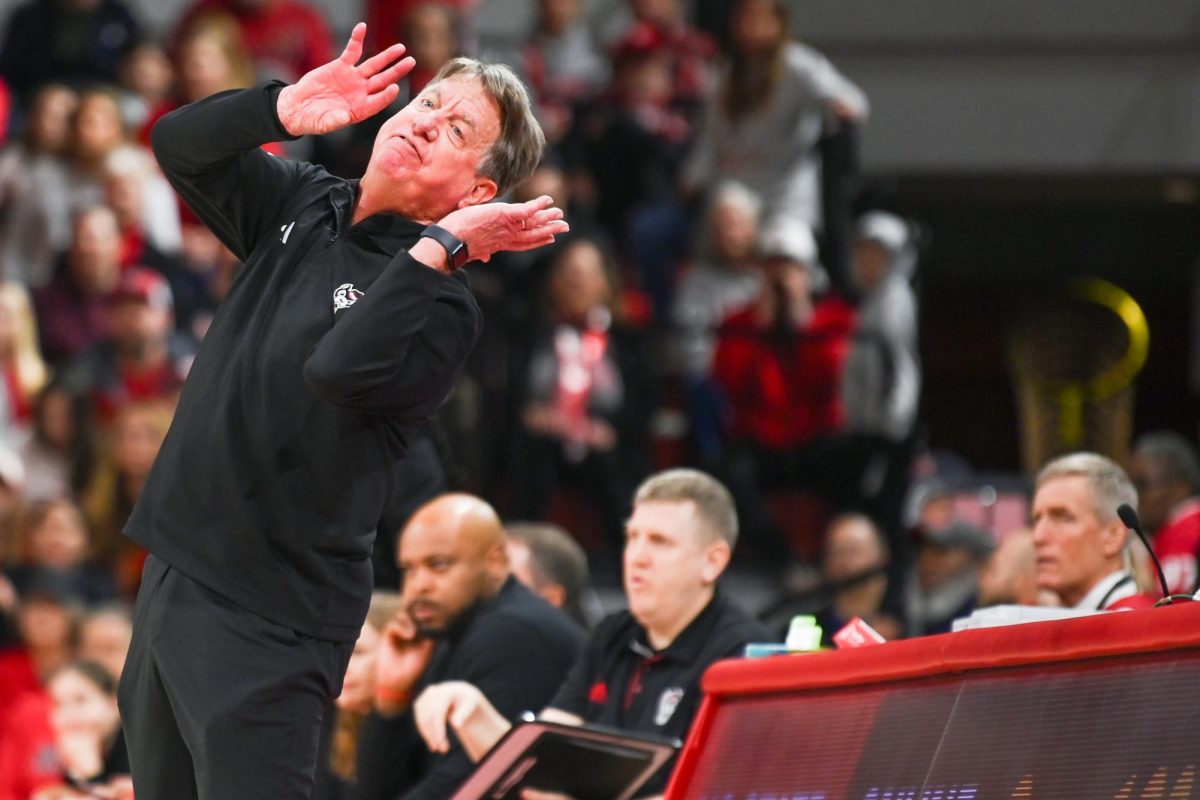 Head coach Wes Moore reacts to the whistle blowing during the game against Syracuse in Reynolds Coliseum on Sunday, Feb. 22, 2026. NC State beat Syracuse 82-69.
