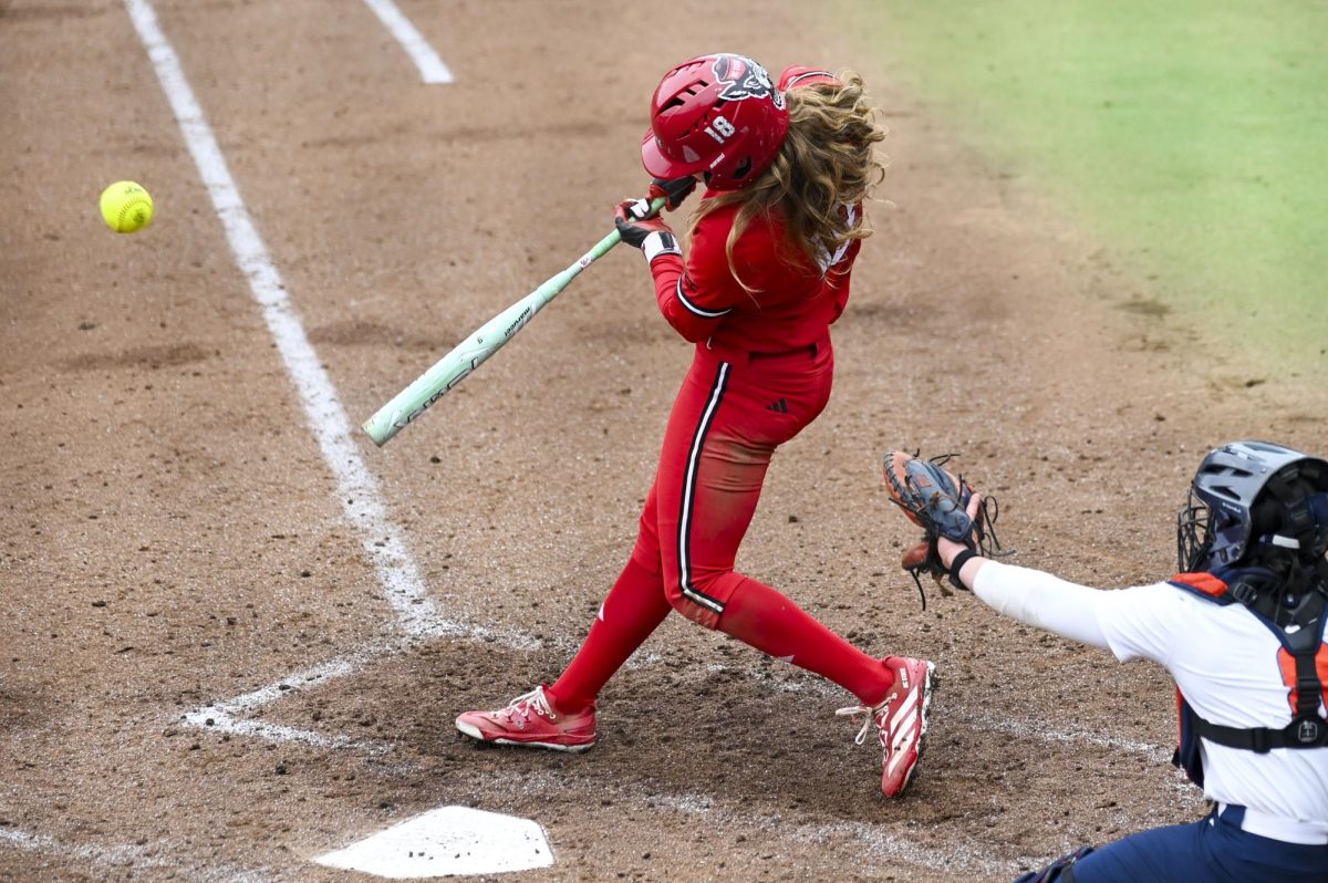 Junior outfielder Sarah Johnson bats during the game against Illinois in Dail Softball Stadium on Sunday, Feb. 22, 2026. The Wolfpack defeated the Illini 4-0. 
