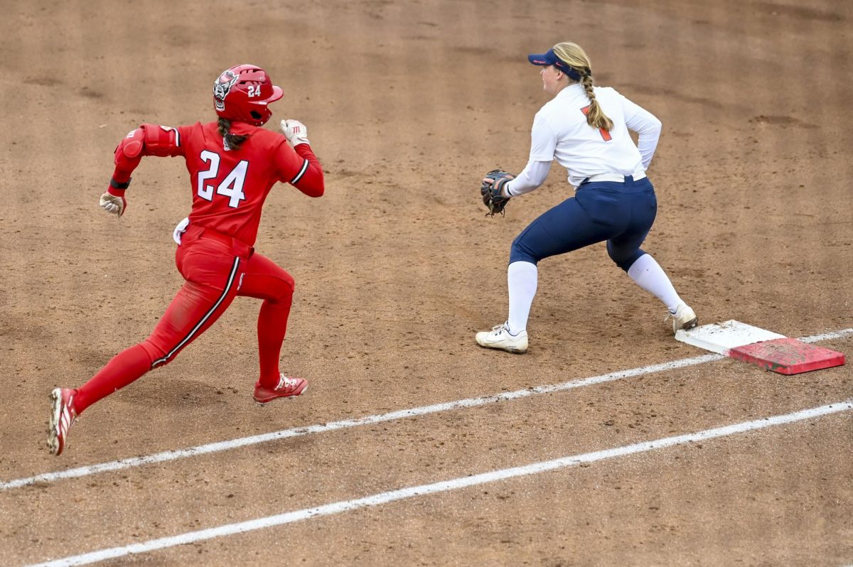 Sophomore outfielder Taryn Massey sprints to first during the game against Illinois in Dail Softball Stadium on Sunday, Feb. 22, 2026. The Wolfpack defeated the Illini 4-0. 