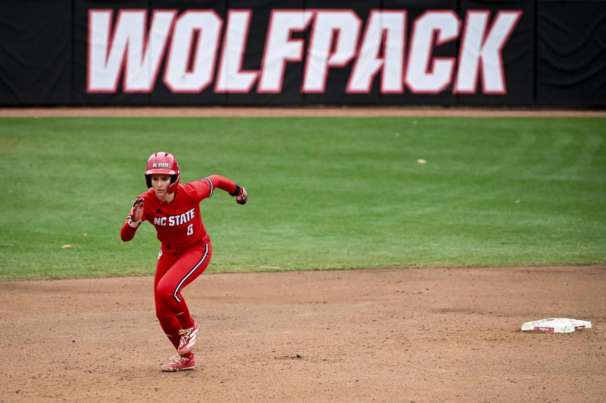 Freshman shortstop Carly Short runs to third during the game against Illinois in Dail Softball Stadium on Sunday, Feb. 22, 2026. The Wolfpack defeated the Illini 4-0. 
