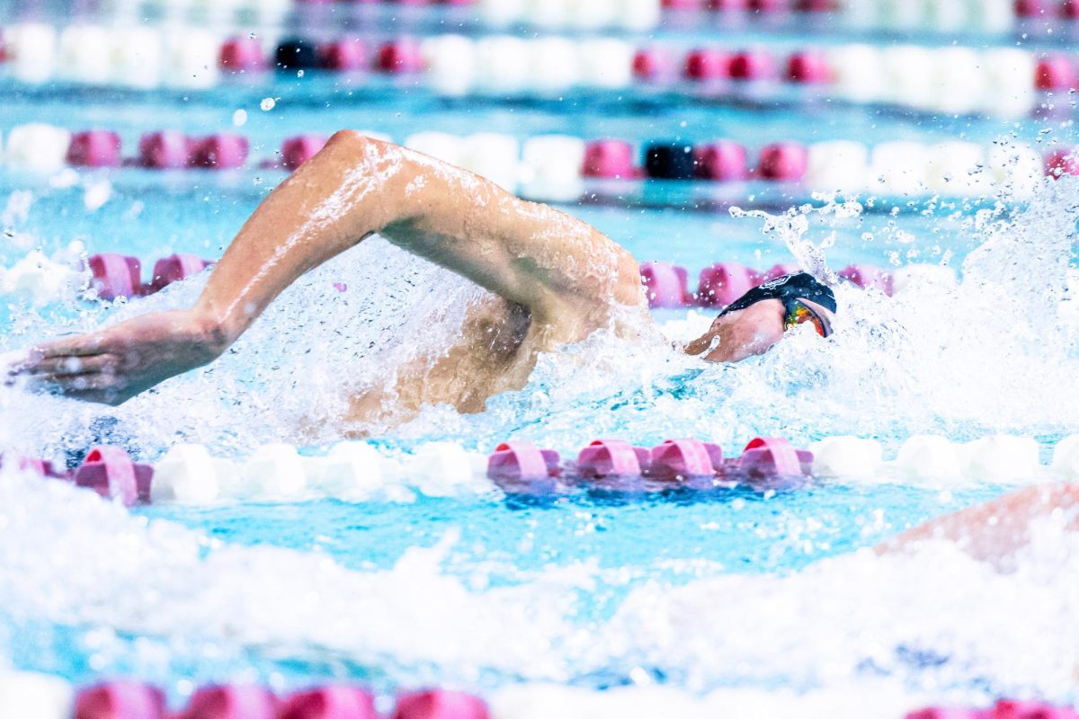 Sophomore Kaii Winkler swims during the meet against Virginia in the Casey Aquatic Center on Friday, Jan. 23, 2026. NC State Men beat Virginia 172.5-89.5