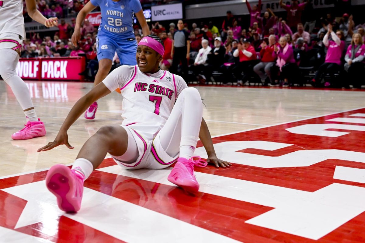 Freshman guard Destiny Lunan recovers from a fall during the Play4Kay game against UNC-Chapel Hill at Reynolds Coliseum on Monday, Feb. 2, 2026. The Tar Heels defeated the Wolfpack 61-59. 