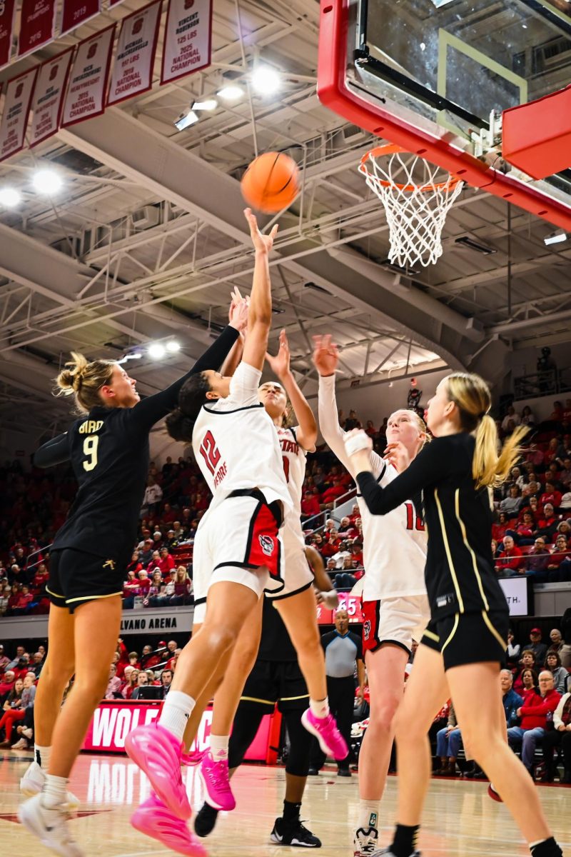 Junior forward Khamil Pierre attempts a layup during the game against Wake Forest at Reynolds Coliseum on Thursday, Feb. 26, 2026. Pierre scored 10 points. The Wolfpack defeated the Demon Deacons 65-56.