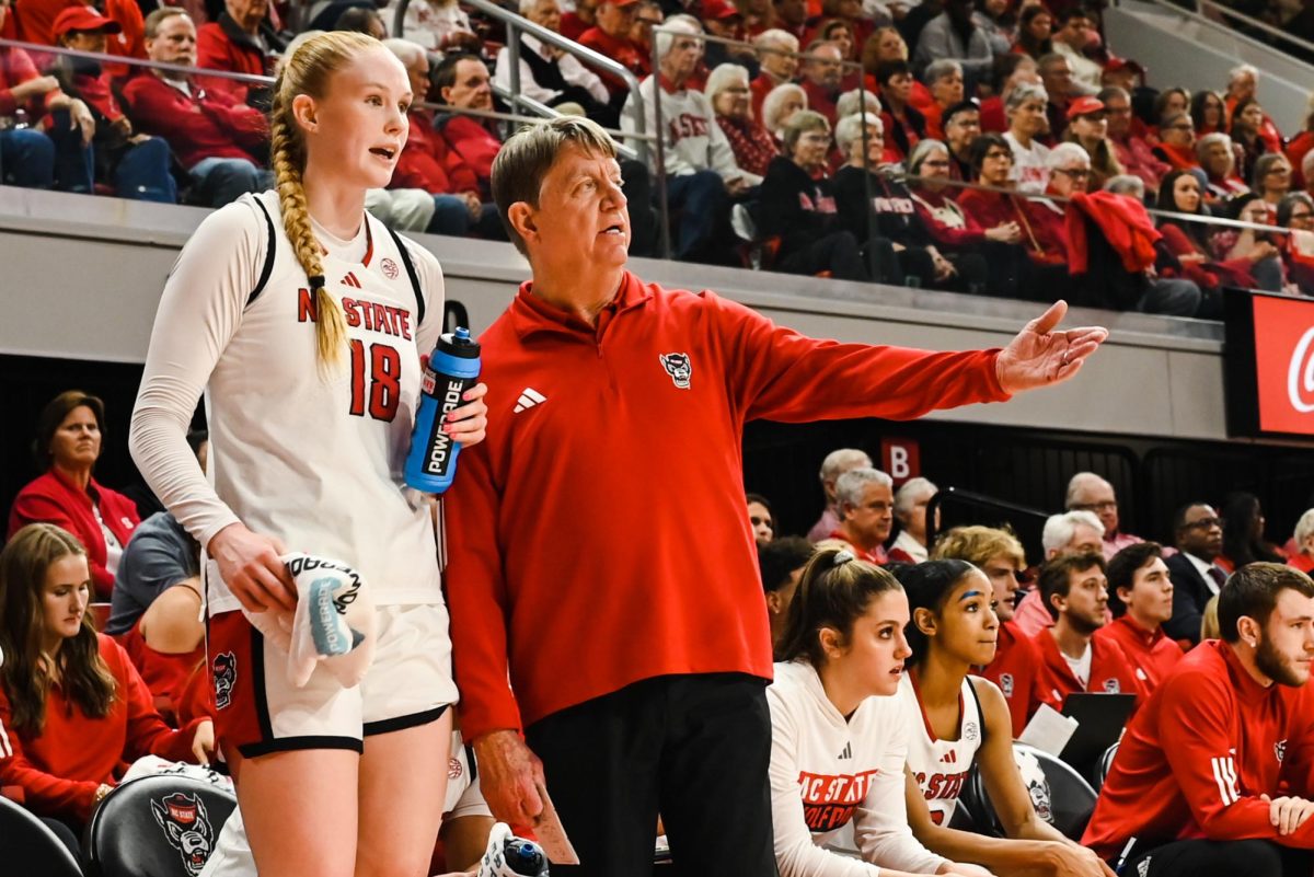 Sophomore forward Tilda Trygger and head coach Wes Moore talk during the game against Wake Forest at Reynolds Coliseum on Thursday, Feb. 26, 2026. The Wolfpack defeated the Demon Deacons 65-56.