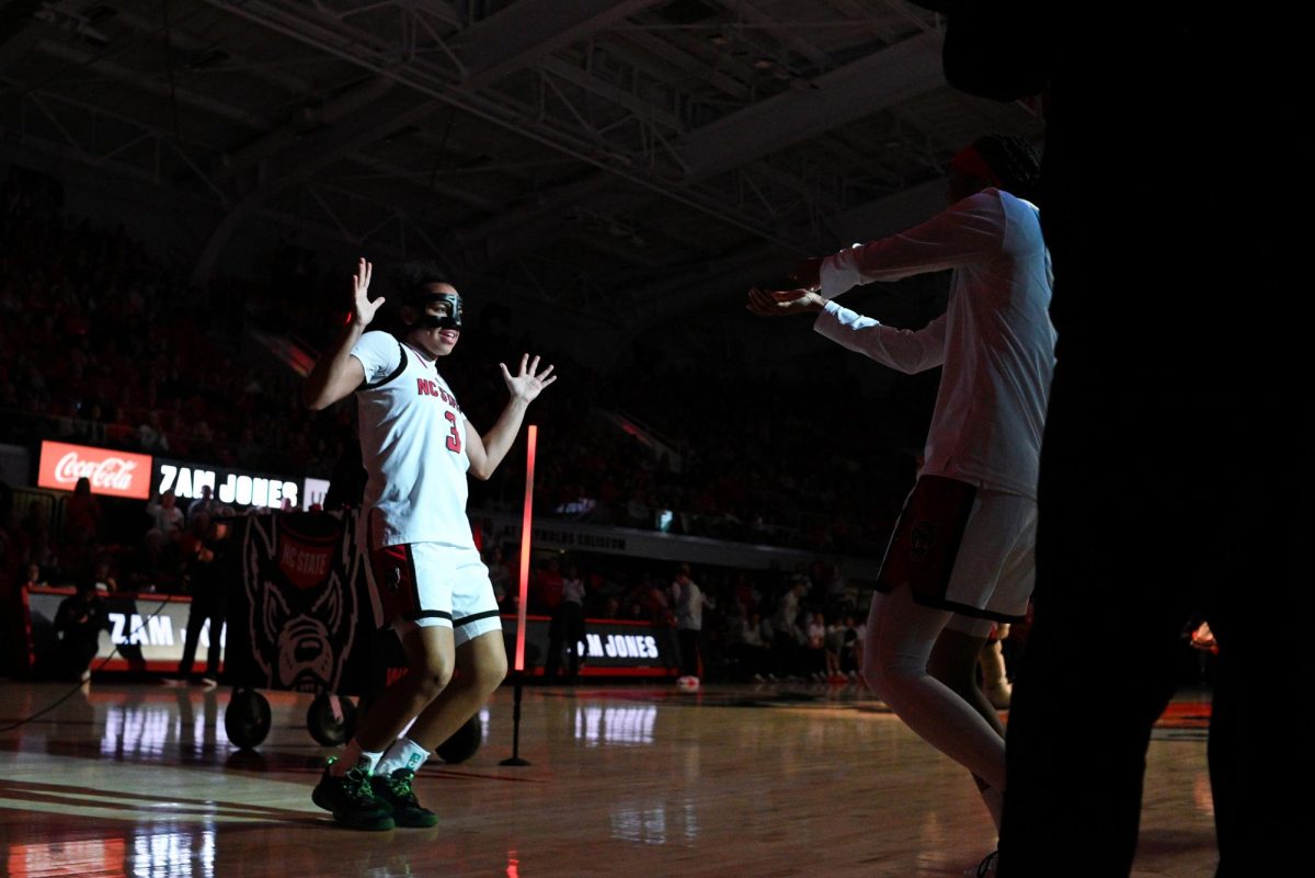 Sophomore guard Zamareya Jones dances during starting lineup introductions before the game against Syracuse at Reynolds Coliseum on Sunday, Feb. 22, 2026. Jones scored 14 points. NC State beat Syracuse 82-69.