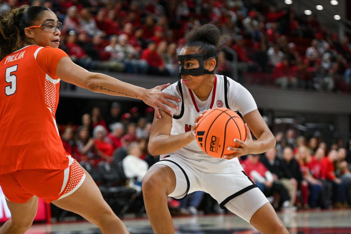 Sophomore guard Zamareya Jones looks to make a drive during the game against Syracuse at Reynolds Coliseum on Sunday, Feb. 22, 2026. Jones scored 14 points. NC State beat Syracuse 82-69.
