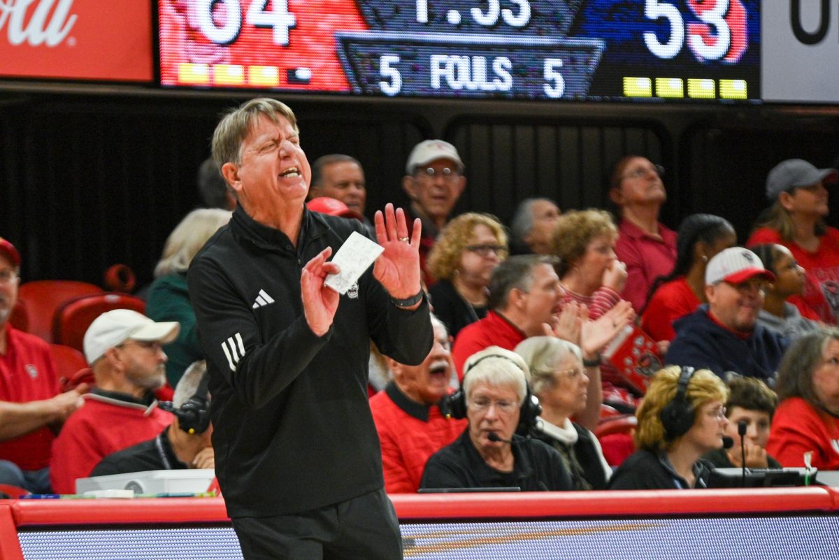 Head coach Wes Moore gets upset after a foul was called during the game against Syracuse at Reynolds Coliseum on Sunday, Feb. 22, 2026. NC State beat Syracuse 82-69.