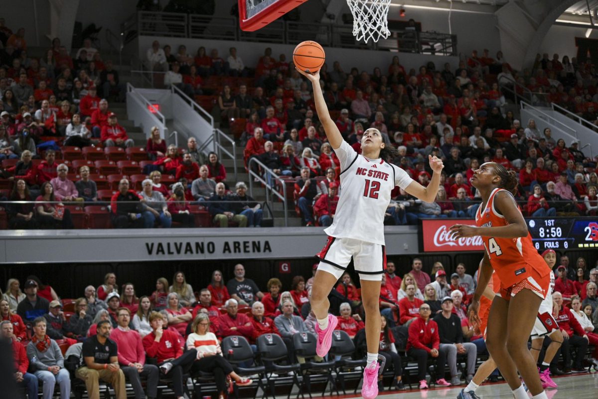 Junior forward Khamil Pierre makes a layup during the game against Syracuse at Reynolds Coliseum on Sunday, Feb. 22, 2026. Pierre scored 25 points. NC State beat Syracuse 82-69.