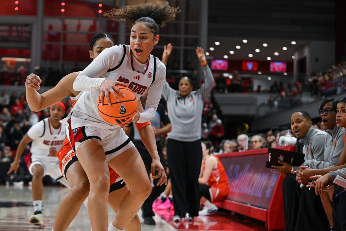 Sophomore guard Devyn Quigley catches a pass during the game against Syracuse at Reynolds Coliseum on Sunday, Feb. 22, 2026. NC State beat Syracuse 82-69.