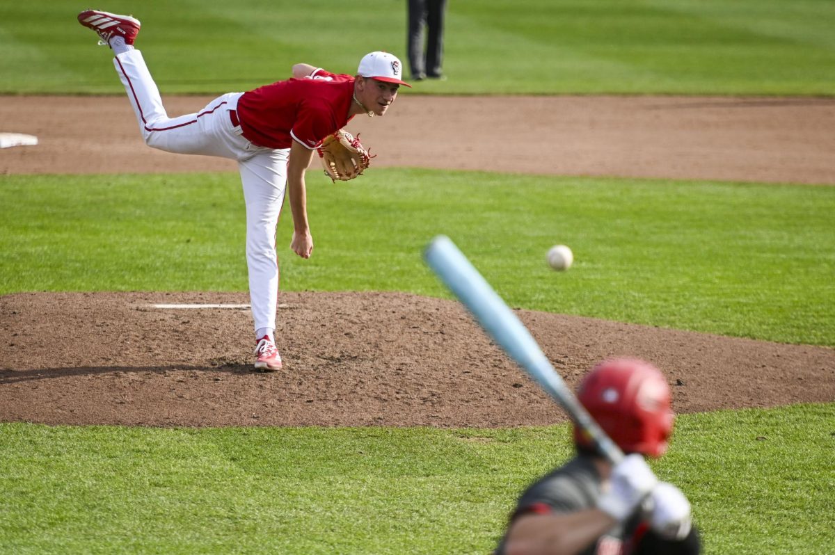 Sophomore pitcher Ryder Garino launches the ball during the game against Sacred Heart in Doak Field in Dail Park on Sunday, March 1, 2026. The Wolfpack defeated the Pioneers 13-0.