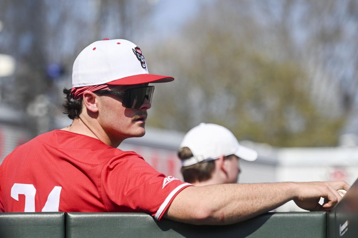 Junior outfielder Devin Mitchell looks over his shoulder during the game against Sacred Heart in Doak Field in Dail Park on Sunday, March 1, 2026. The Wolfpack defeated the Pioneers 13-0.