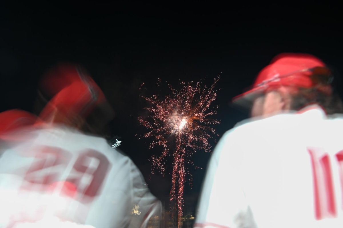 Players watch the fireworks display after the game against Wake Forest on Thursday, May 16, 2024. 