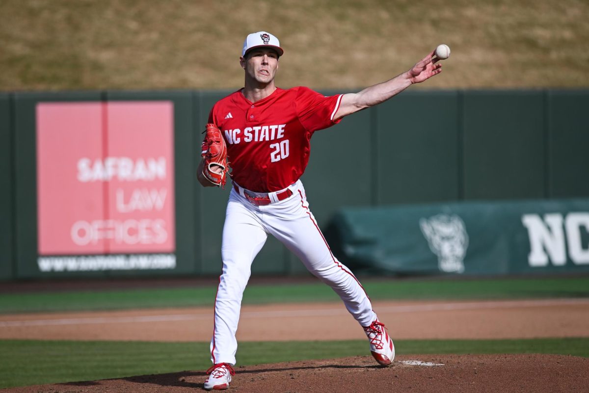 Junior left-handed pitcher Ryan Marohn throws a pickoff to first during the game against Boston College in Doak Field at Dail Park on Friday, March 13, 2026. Marohn threw seven scoreless innings, striking out six. The Wolfpack defeated the Eagles 4-2. 
