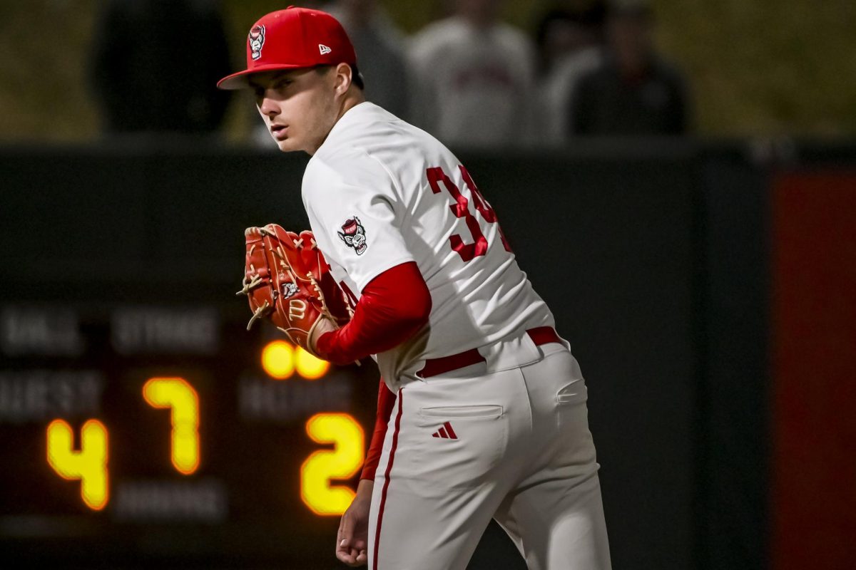 Sophomore right-handed pitcher Anderson Nance glances at a runner during the game against Campbell at Doak Field at Dail Park on Tuesday, March 24, 2026. NC State fell to Campbell 7-2.