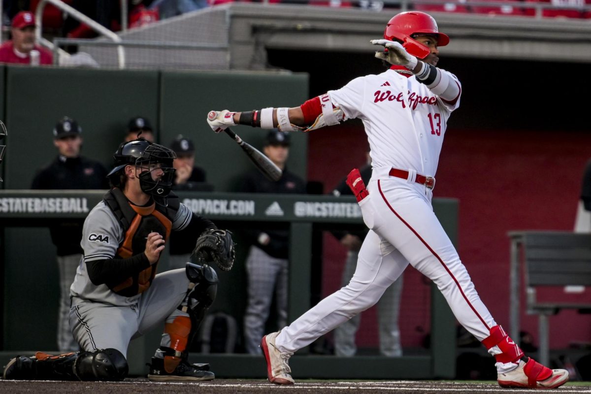 Junior outfielder Andrew Wiggins takes a swing during the game against Campbell at Doak Field at Dail Park on Tuesday, March 24, 2026. NC State fell to Campbell 7-2.