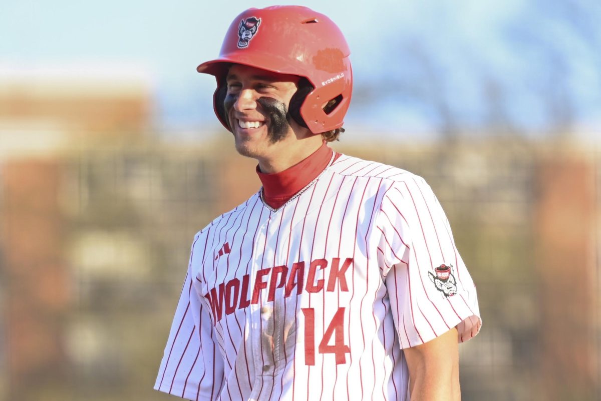 Sophomore outfielder Ty Head smiles on first base during the game against Lafayette in Doak Field at Dail Park on Saturday, March 7, 2026. Head had one run, two hits and five RBIs during the game. NC State beat Lafayette 10-4.