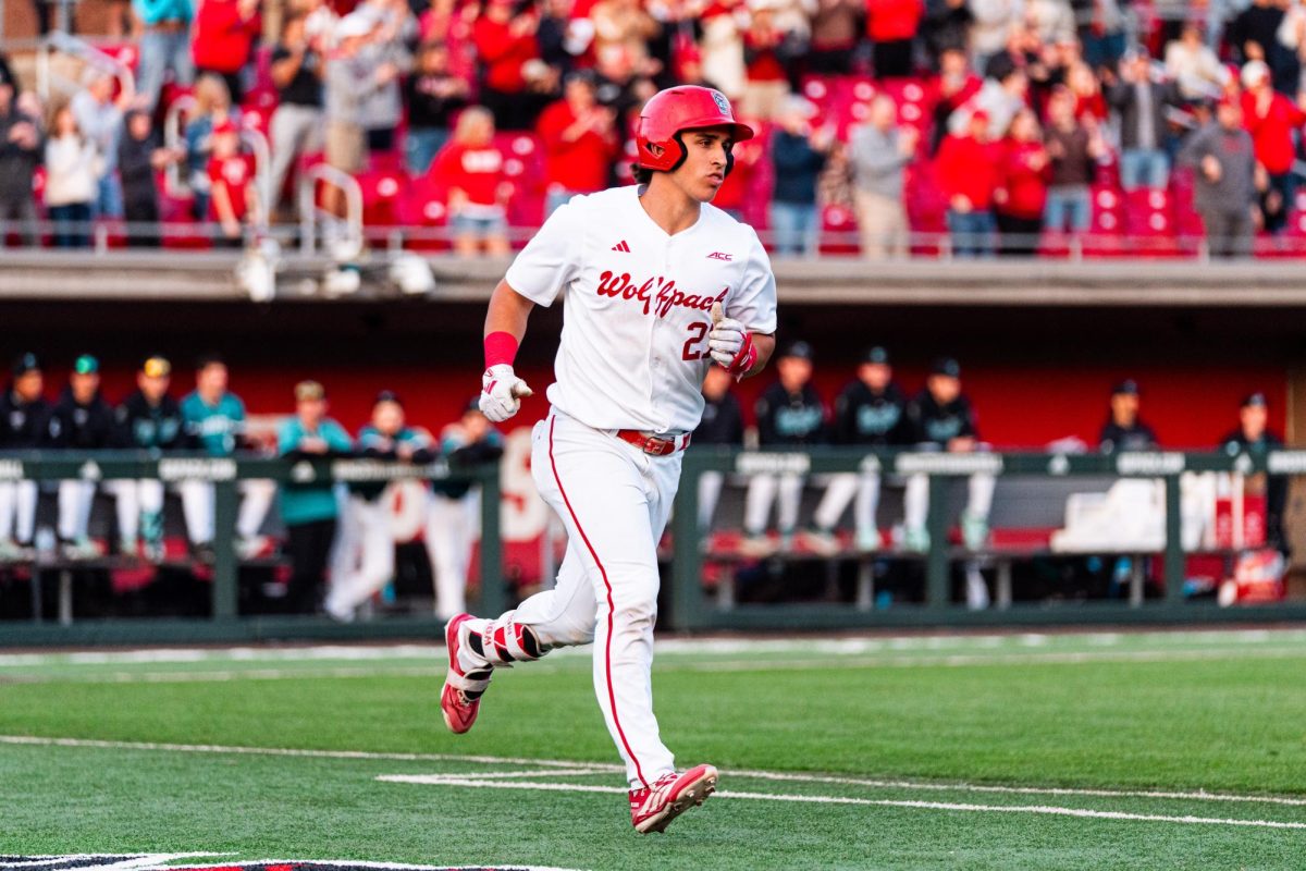 Junior infielder Chris McHugh rounds the bases after hitting his first home run of the game against Coastal Carolina in Doak Field at Dail Park on Tuesday, March 3, 2026. The Wolfpack defeated the Chanticleers 6-4.