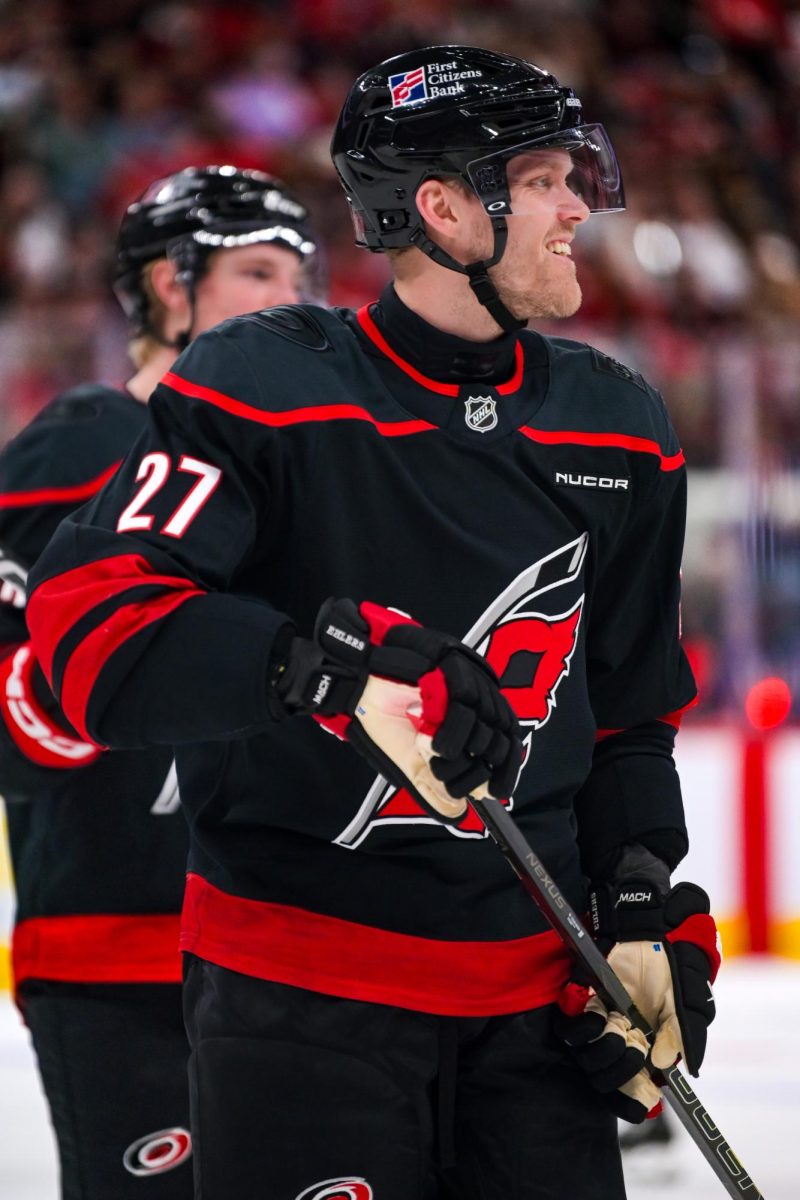 Left wing Nikolaj Ehlers smiling after a play during the game versus the New Jersey Devils at the Lenovo Center on Saturday, March 28, 2026. The Canes beat the Devils 5-2.