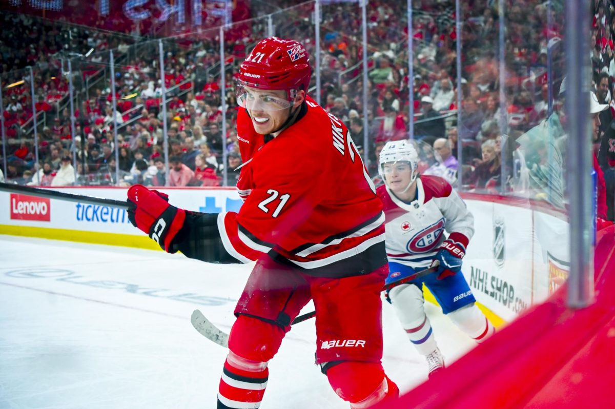 Defenseman Alexander Nikishin passes the puck during the game versus the Montreal Canadiens at the Lenovo center on Sunday, March 29, 2026. The Canadiens beat the Hurricanes 3-1.