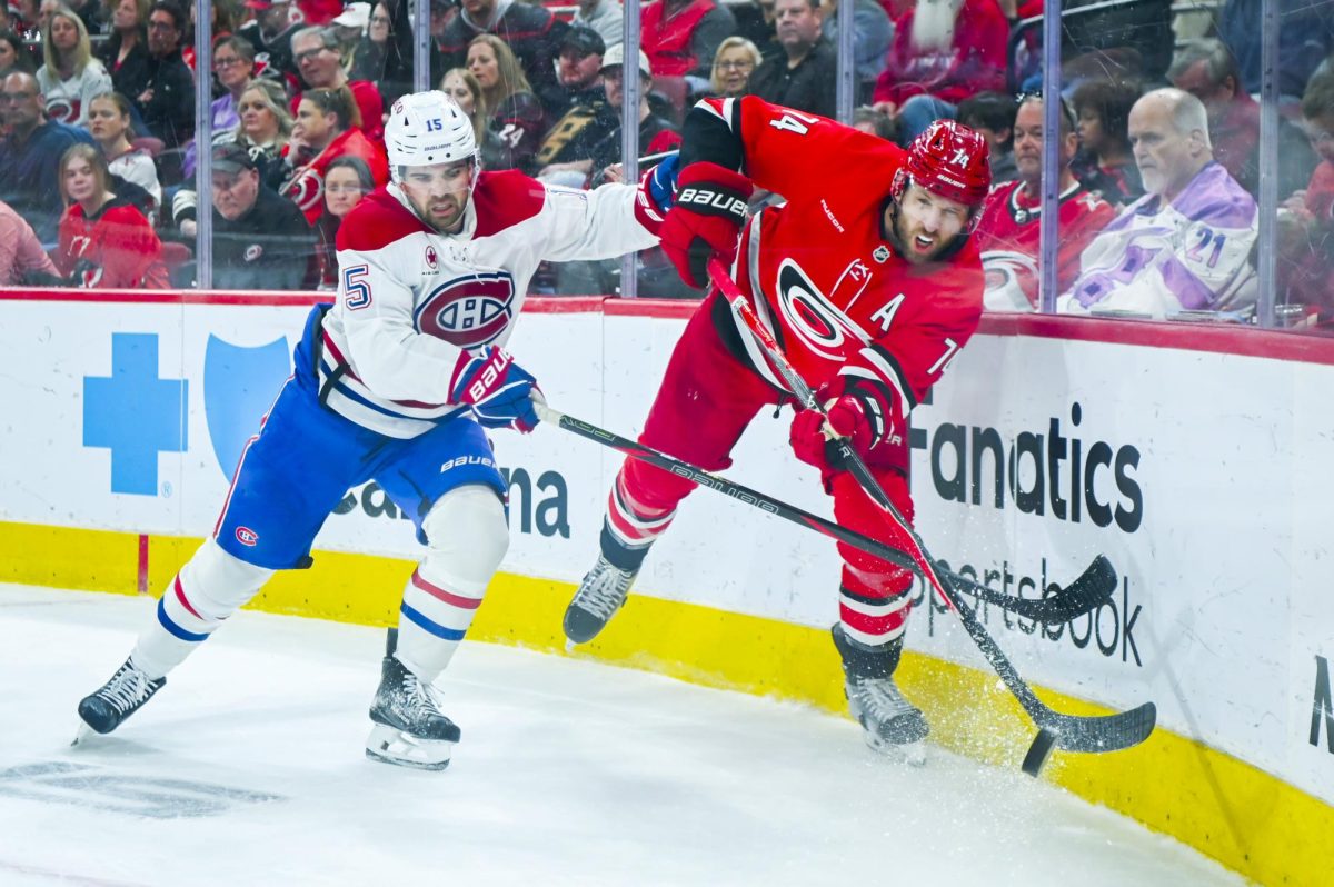 Defenseman Jaccob Slavin passes the puck during the game versus the Montreal Canadiens at the Lenovo center on Sunday, March 29, 2026. The Canadiens beat the Hurricanes 3-1.