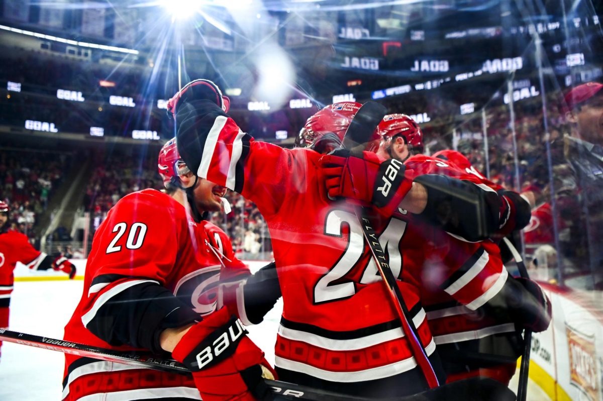 Centers Seth Jarvis and Sebastian Aho and right wing Andrei Svechnikov celebrate after scoring a goal during the game versus the Montreal Canadiens at the Lenovo center on Sunday, March 29, 2026. Svechnikov scored one goal for the Hurricanes. The Canadiens beat the Hurricanes 3-1.
