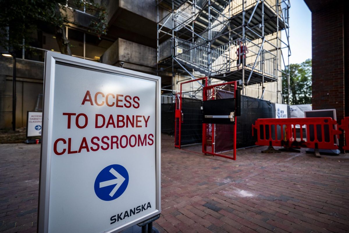 Signs read “Access to Dabney Classrooms” outside of Dabney Hall on Monday, March 23, 2026. Entrances to the building have changed during the most recent wave of renovations, which include the removal of hazardous materials like asbestos and lead paint following strict safety protocols.