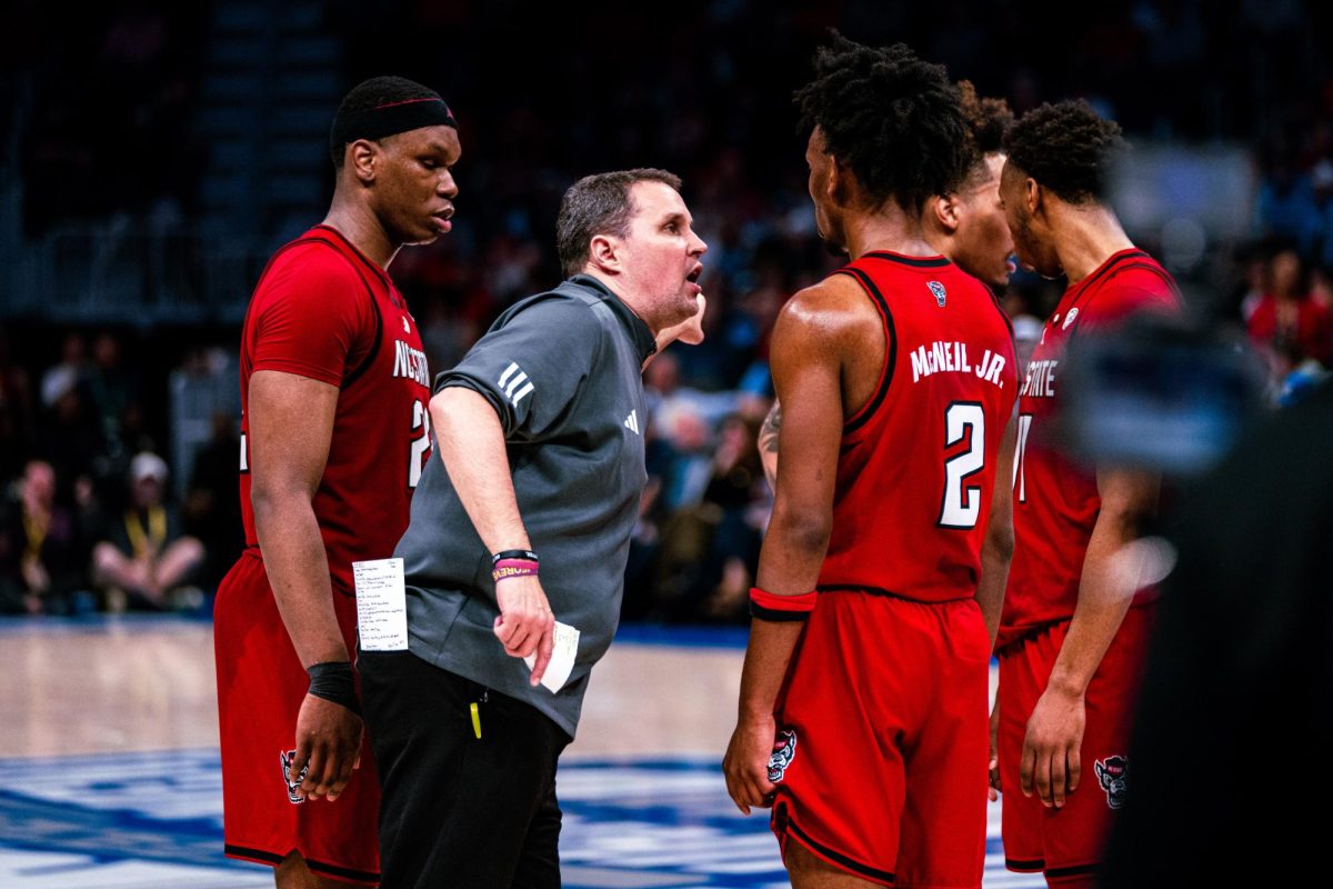 Head Coach Will Wade speaks to his lineup during the game against Virginia in the Spectrum Center on Thursday, March 12, 2026. NC State fell to Virginia 81-74.