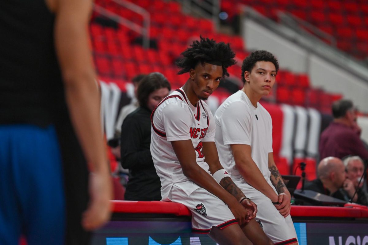 Sophomore guard Paul McNeil watches Duke freshman Cayden Boozer before the game against Duke at the Lenovo Center on Monday, March 2, 2026. The Wolfpack fell to the Blue Devils 93-64. 
