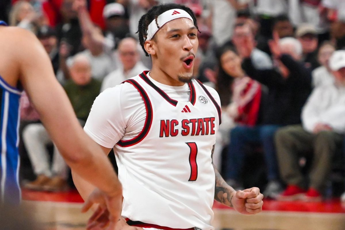 Senior forward Darrion Williams reacts to his made three pointer during the game against Duke at the Lenovo Center on Monday, March 2, 2026. The Wolfpack fell to the Blue Devils 93-64. Williams finished with 17 points. 
