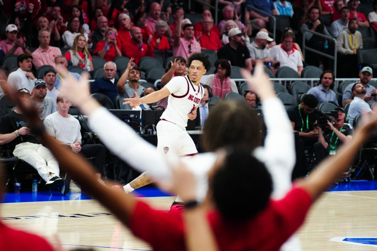 Senior forward Darrion Williams celebrates during the game against Pittsburgh in the Spectrum Center on Wednesday, March 11, 2026. Williams recorded 12 points. NC State beat Pittsburgh 98-88.