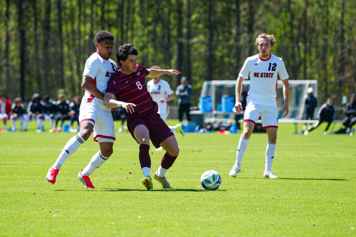 Redshirt sophomore defender Nakai Antoine attempts to win the ball during the match against Virginia Tech at WakeMed Soccer Park on Saturday, March 28, 2026. NC State fell to Virginia Tech 1-0.
