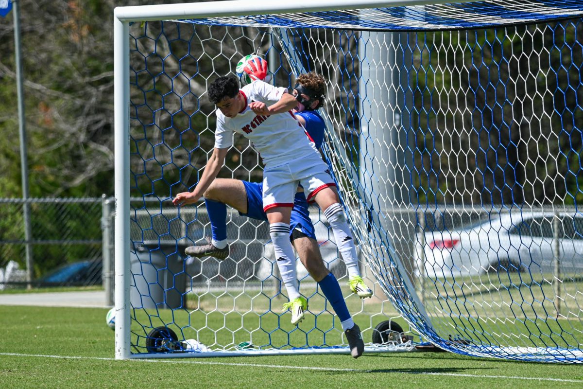 Junior forward Frankie DeFrancesco collides with sophomore goalkeeper Leo Ledin during the match against Virginia Tech at WakeMed Soccer Park on Saturday, March 28, 2026. NC State fell to Virginia Tech 1-0.