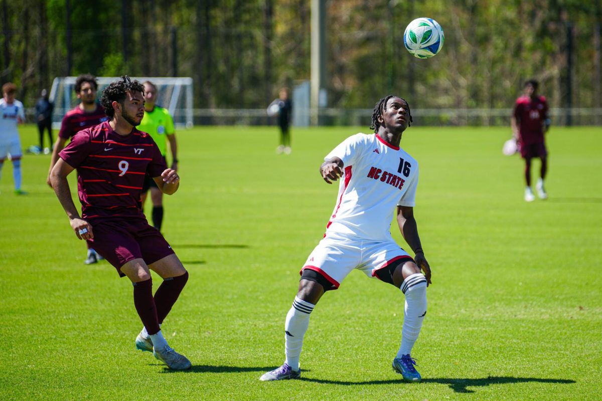 Sophomore forward Mohamed Kallon looks at the ball during the match against Virginia Tech at WakeMed Soccer Park on Saturday, March 28, 2026. NC State fell to Virginia Tech 1-0.
