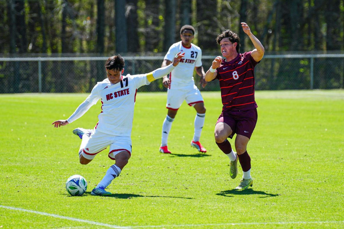 Graduate midfielder Caden Tolentino prepares to shoot the ball during the match against Virginia Tech at WakeMed Soccer Park on Saturday, March 28, 2026. NC State fell to Virginia Tech 1-0.