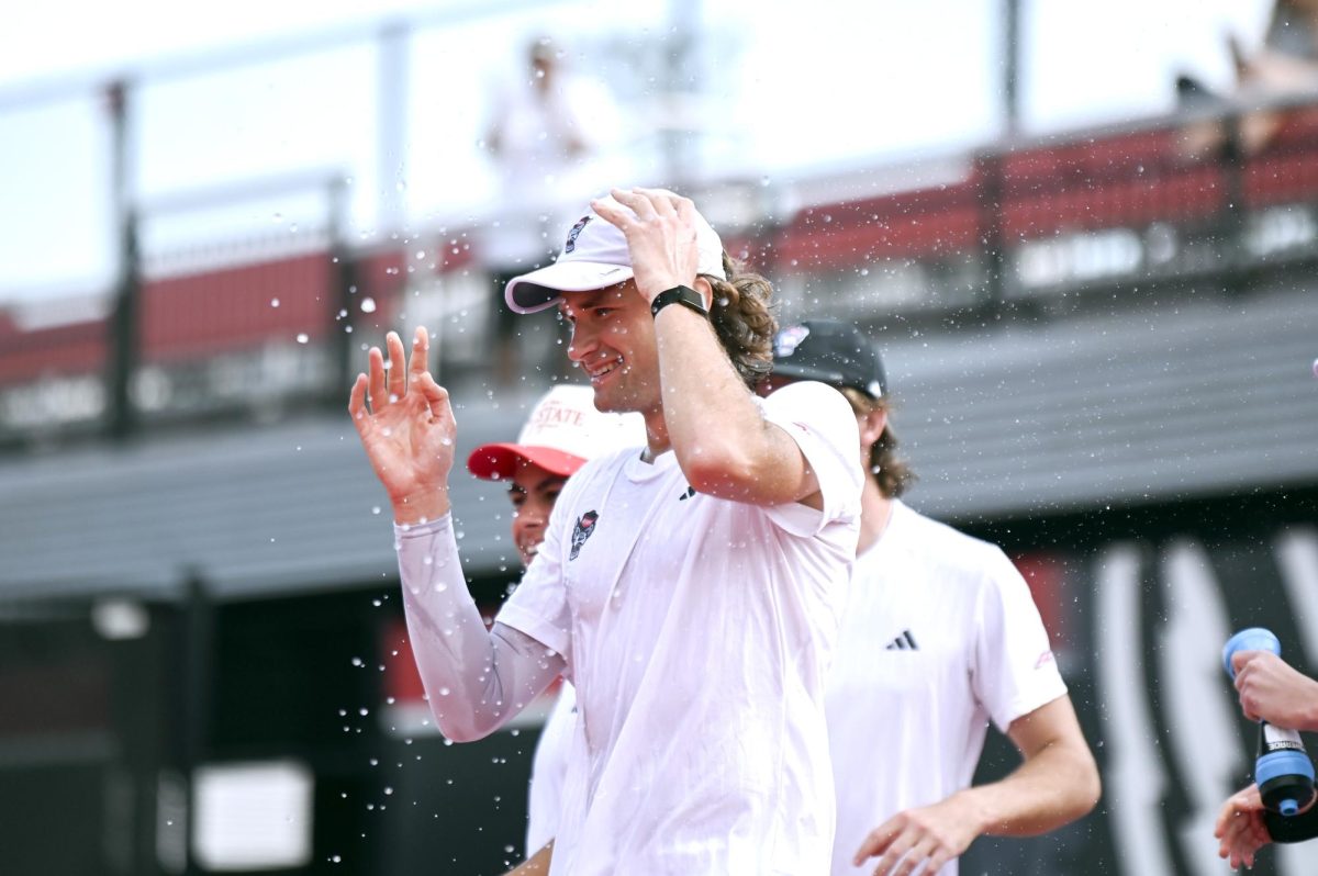Senior Martin Borisiouk celebrates after winning his singles match versus Clemson at J.W. Isenhour Tennis Center on Sunday, March 1, 2026. Borisiouk won his singles match 2-1 (6-7, 6-1, 6-3). NC State beat Clemson 4-3.