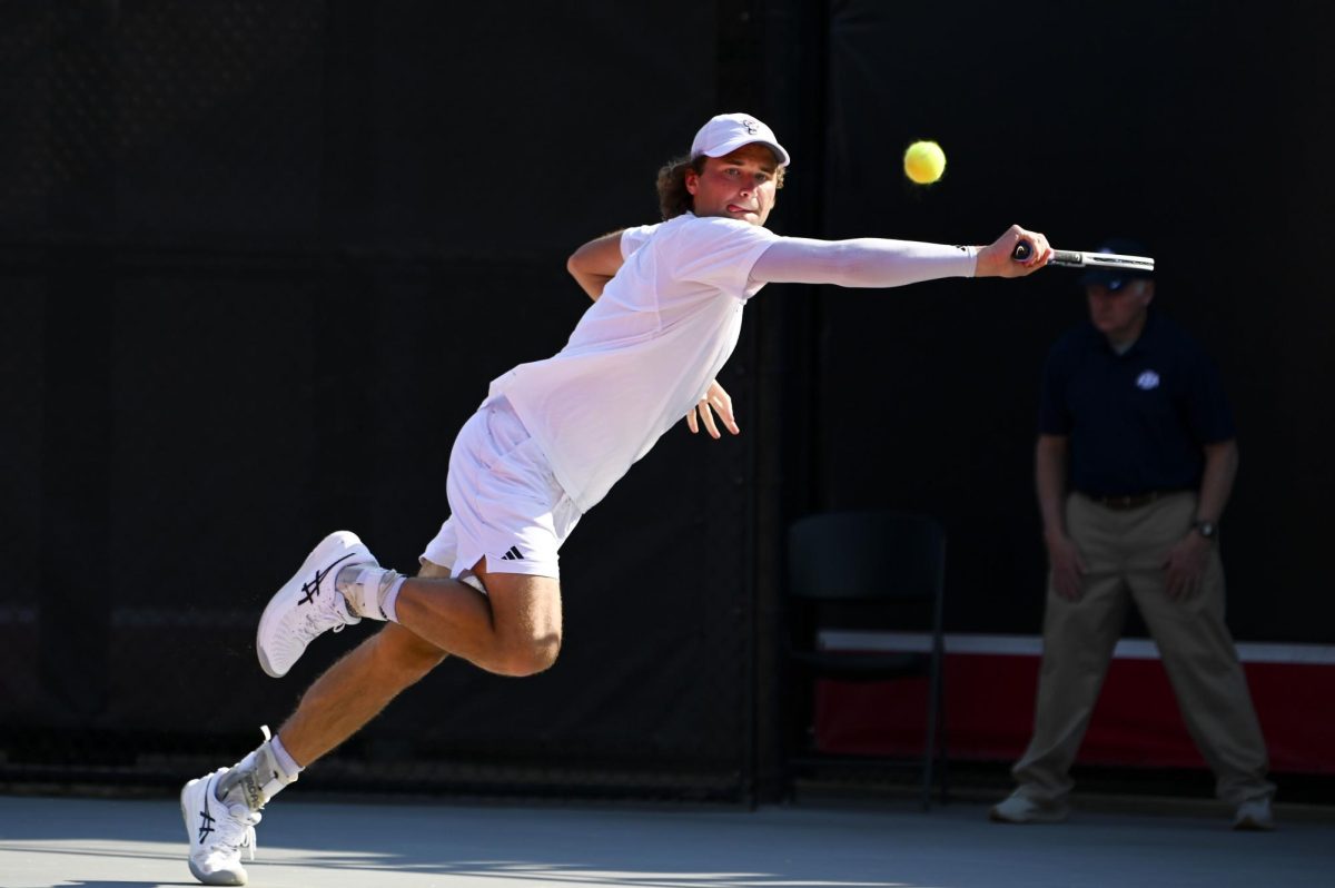 Senior Martin Borisiouk lunges for the ball during the match versus Clemson at J.W. Isenhour Tennis Center on Sunday, March 1, 2026. Borisiouk won his singles match 2-1 (6-7, 6-1, 6-3). NC State beat Clemson 4-3.