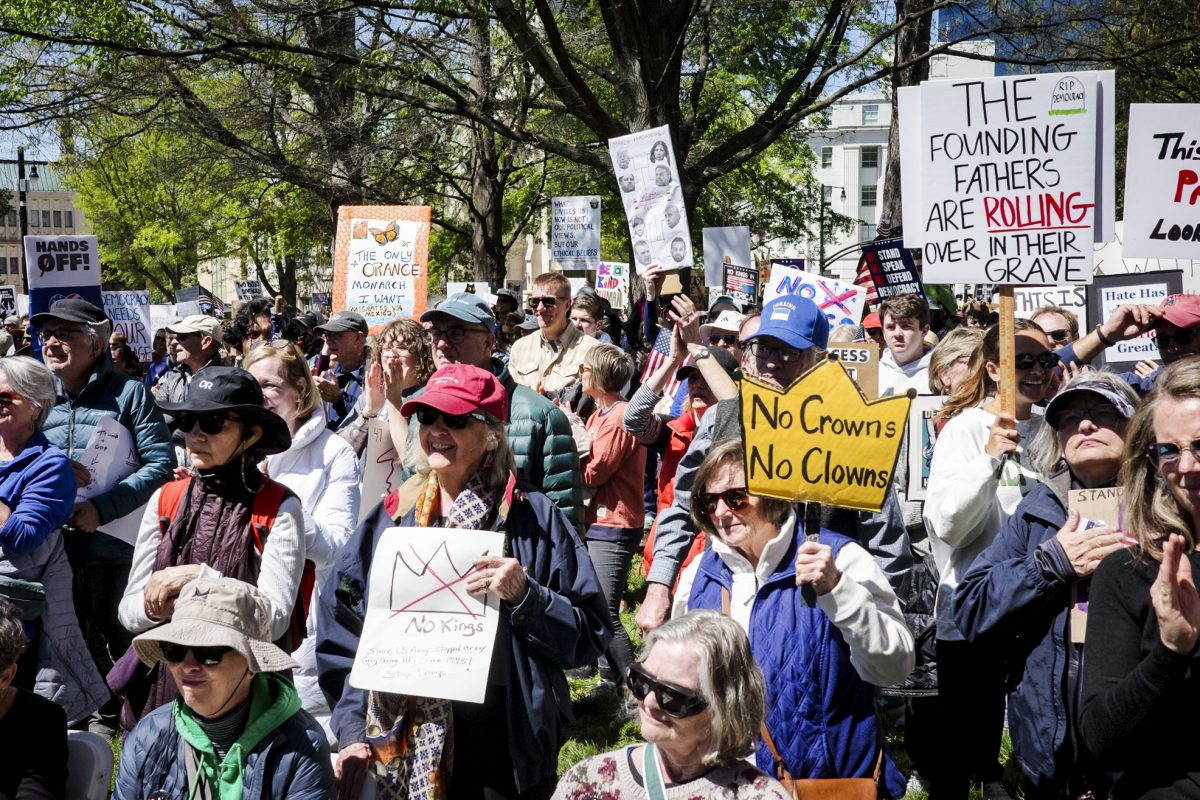 Protesters hold up signs during the No Kings protest in Raleigh, North Carolina, on Saturday, March 28, 2026.
