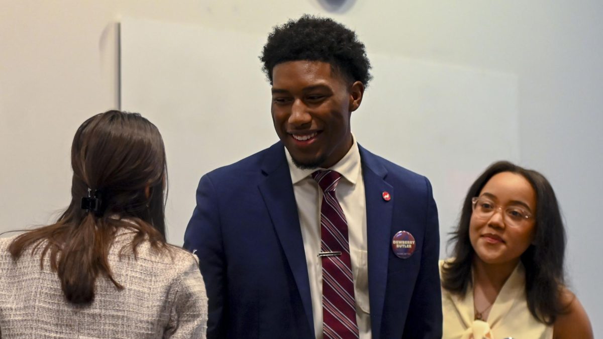 Taquan Dewberry, a third-year studying philosophy and applied education and candidate for Student Body President, shakes the hand of Hubbard Stack, a first-year in the College of Textiles and candidate for Student Body Vice President after the Student Government Debates in the SG Governance Chamber in Talley Student Union on Monday, March 2, 2026. 