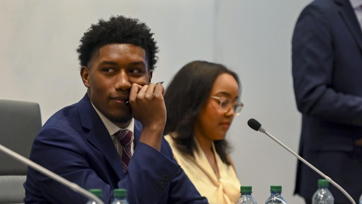 Taquan Dewberry, a third-year studying philosophy and applied education and candidate for Student Body President, smiles during the Student Government Debates in the SG Governance Chamber in Talley Student Union on Monday, March 2, 2026. 