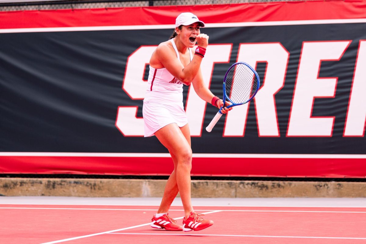 Sophomore Mia Slama pumps her fist after scoring a point during her match against Miami at Dail Outdoor Tennis Stadium on Sunday, March 8, 2026. Slama lost her singles match 7-6,6-7,5-7. NC State lost to Miami 4-3.
