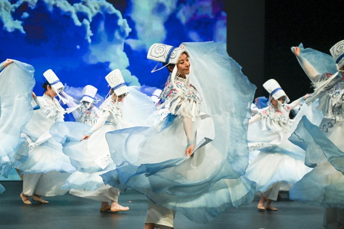 Dancers from Sunny Performing Arts twirl onstage at Asia Night, hosted by the ASA at Stewart Theater on Tuesday, March 31, 2026. Asia Night, an annual celebration of Asian culture, featured live performances by many artists including the Kabayan Dance Crew, the Gangalicious, and Yoonha Verse.