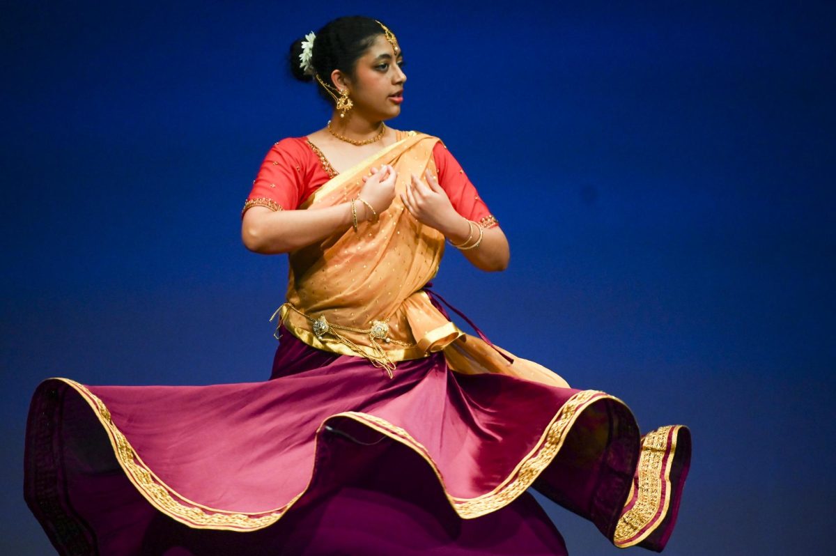 Shreeya Wadodkar, a third-year studying computer science, dances onstage at Asia Night, hosted by the ASA at Stewart Theater on Tuesday, March 31, 2026. Asia Night, an annual celebration of Asian culture, featured live performances by many artists including the Kabayan Dance Crew, Sunny Performing Arts, and Yoonha Verse.