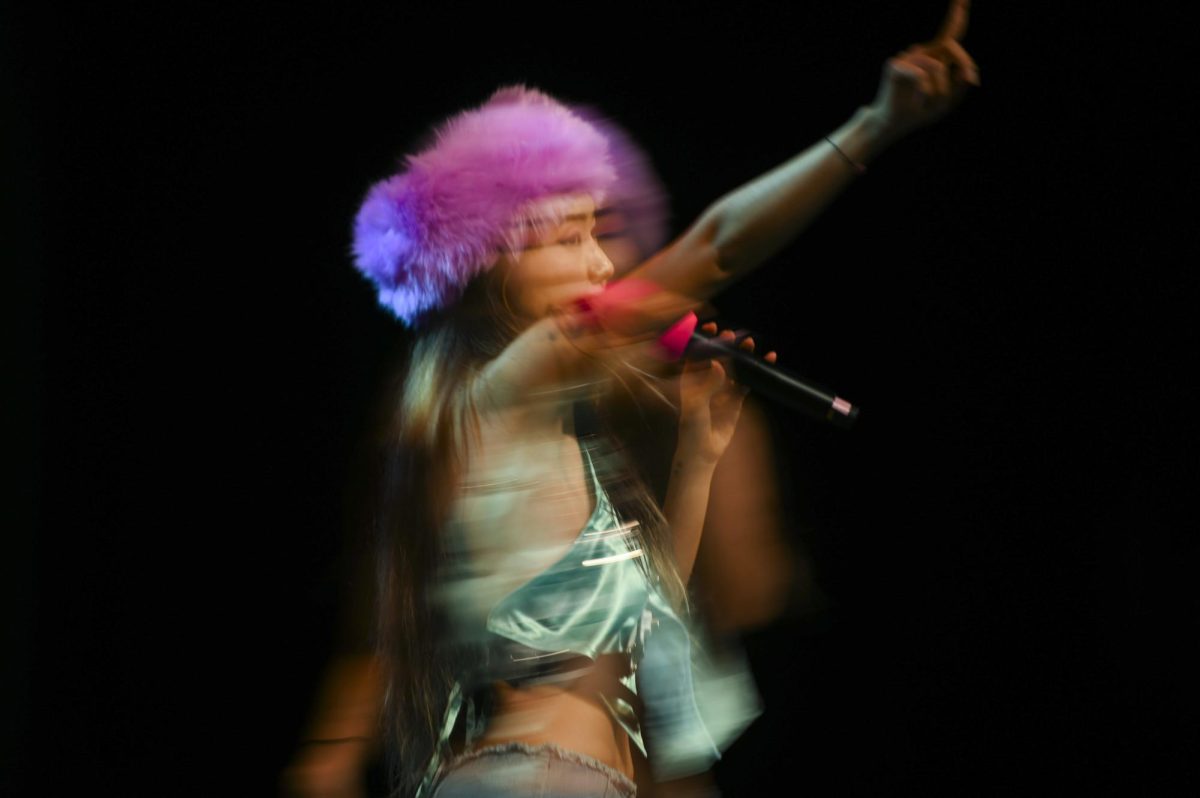 Multiple long exposure of space-pop artist Yoonha Verse pointing at the crowd at Asia Night, hosted by the ASA at Stewart Theater on Tuesday, March 31, 2026. Asia Night is an annual celebration of Asian culture, featuring dance performances from China, the Philippines, and India, as well as live music and a fashion showcase.