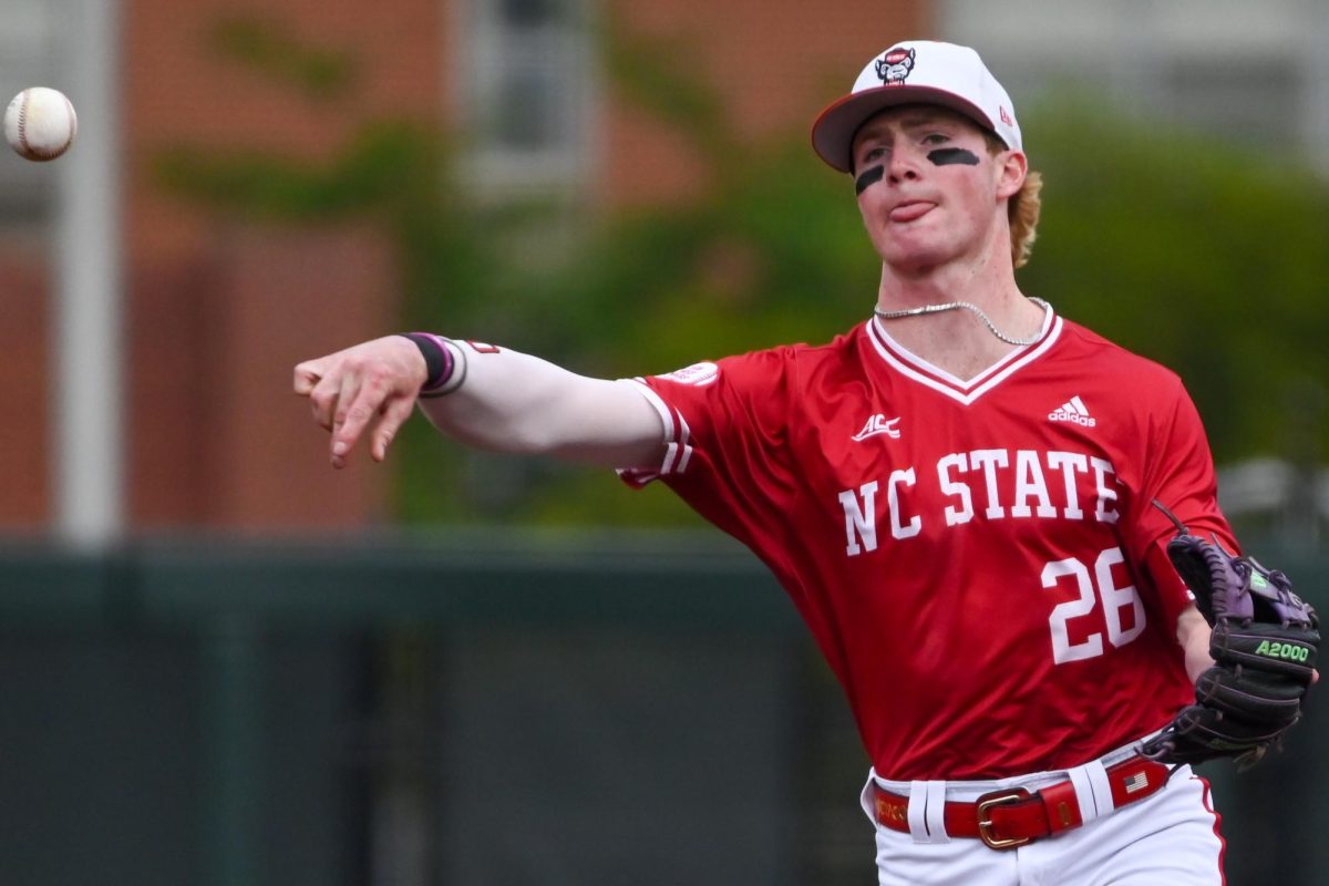 Junior infielder Luke Nixon throws the ball during the game against East Carolina at Doak field at Dail park on Tuesday, April 28, 2026. Nixon went three for four. NC State beat ECU 12-2.