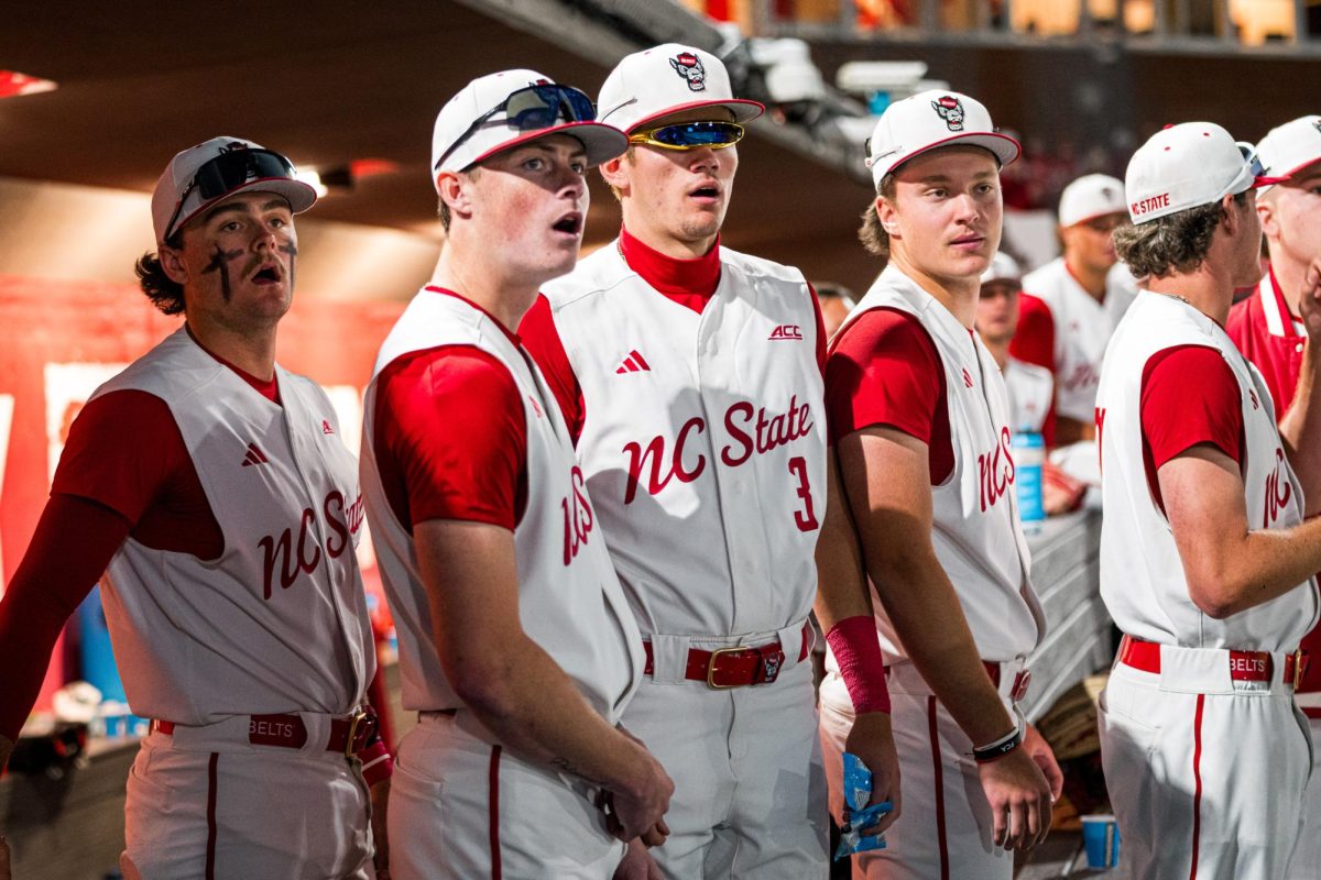 NC State players reacts to the re-entry of Artemis II during the game against Duke at Doak Field at Dail Park on Friday, April 10, 2026. The Wolfpack beat The Blue Devils 10-4.