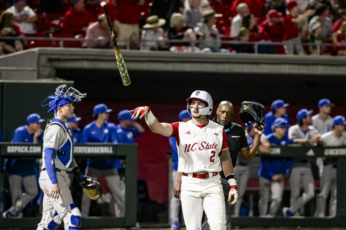 Sophomore infielder Mikey Ryan flips his bat after hitting a home run during the game against Duke at Doak Field at Dail Park on Friday, April 10, 2026. Ryan recorded two home runs during the game. NC State defeated Duke 10-4.
