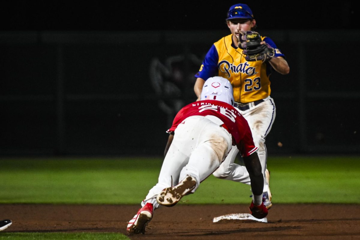 Junior infielder Sherman Johnson dives for second during the game against ECU at Doak Field at Dail Park on Tuesday, April 28, 2026. Johnson was called out on the play. The Wolfpack defeated the Pirates 12-2.