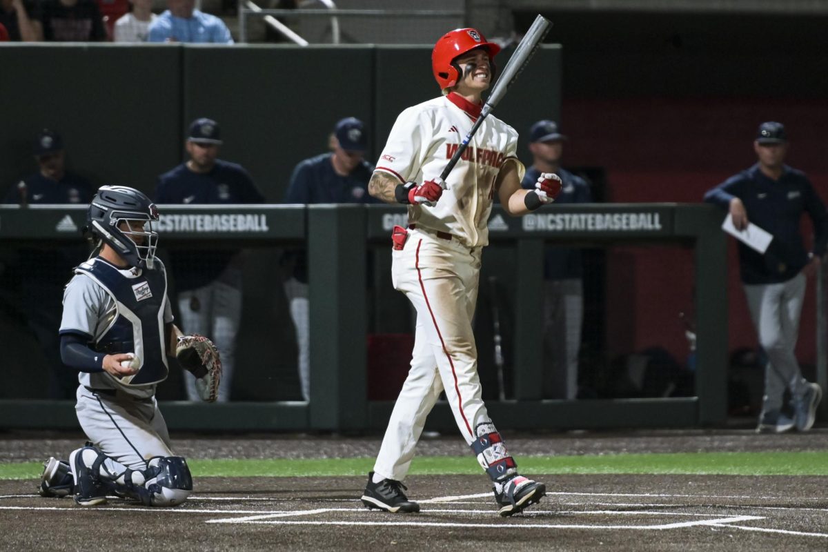 Sophomore outfielder Ty Head makes a pained expression while at bat during the game against Liberty at Doak Field at Dail Park on Tuesday, March 31, 2026. NC State fell to Liberty 7-5.