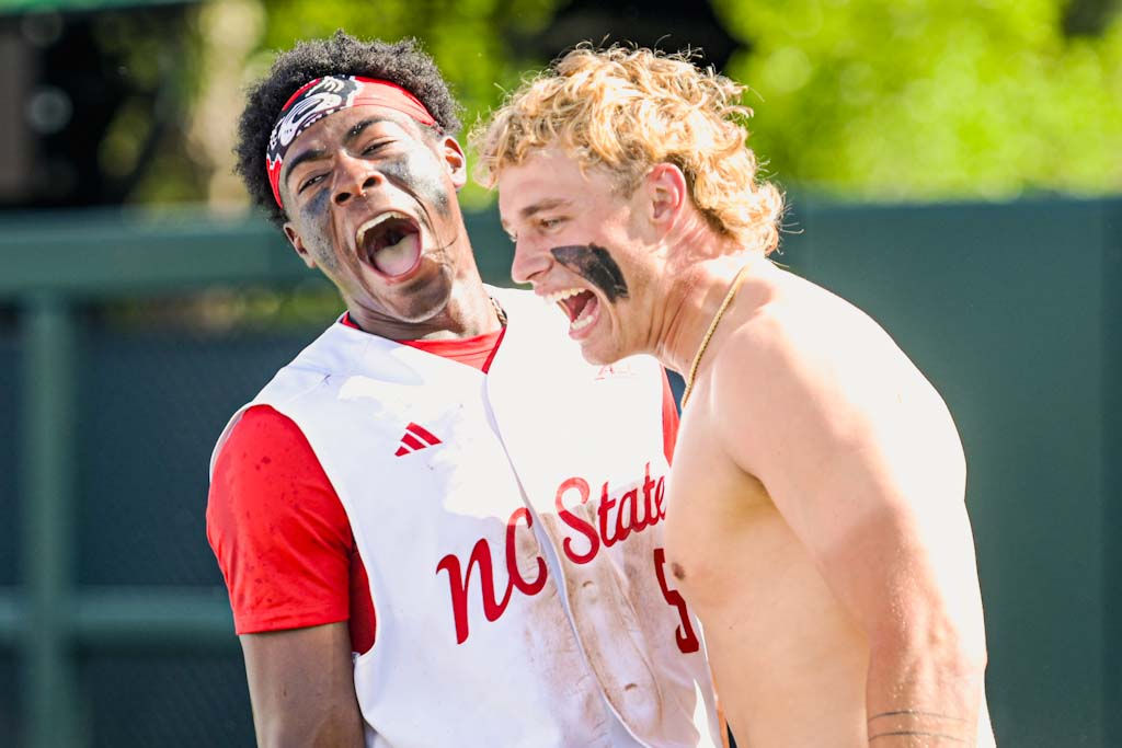 Junior infielder Sherman Johnson and sophomore outfielder Ty Head celebrate the win during the game against Notre Dame at Doak Field at Dail Park on Saturday, April 4, 2026. NC State defeated Notre Dame 7-6.